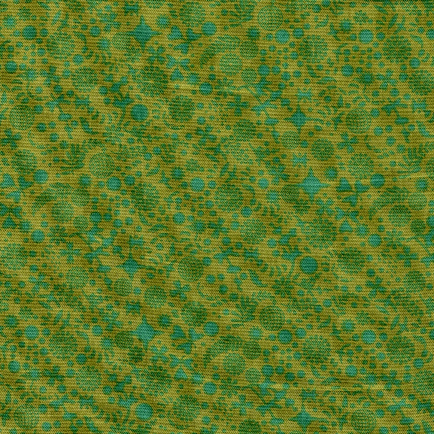 Tissu coton imprimé vert menthe sur fond vert absinthe