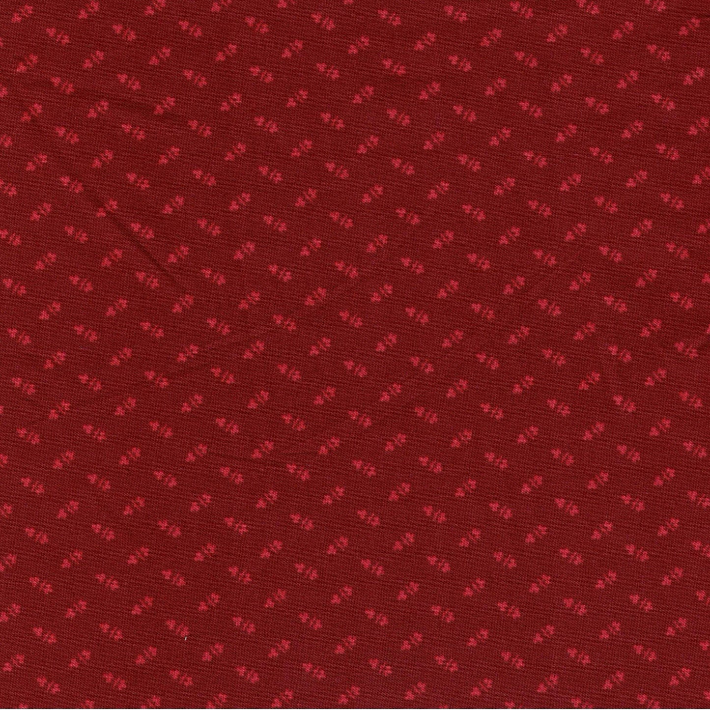 Tissu coton rouge à petits motifs