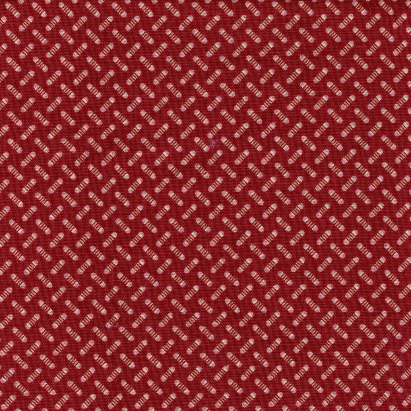 Tissu coton rouge à petits motifs