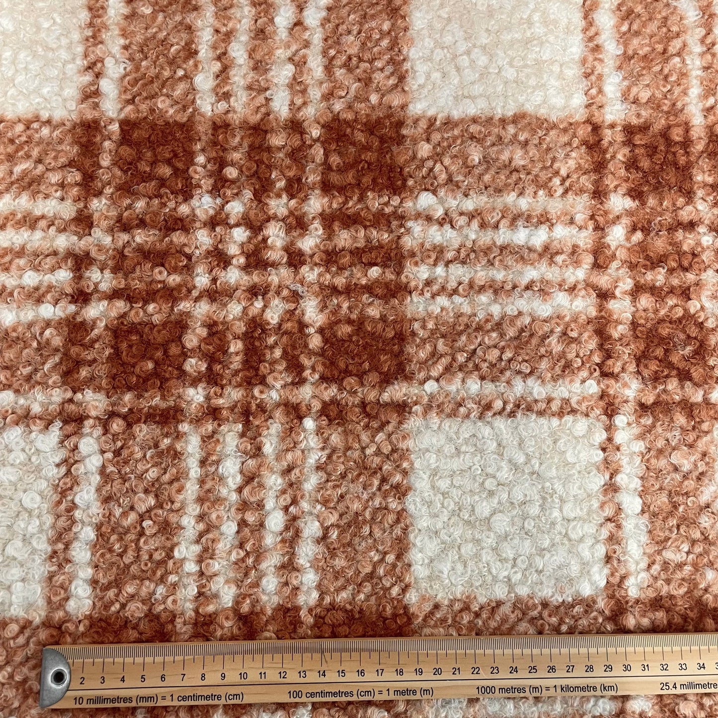 Lainage bouclettes à carreaux orange